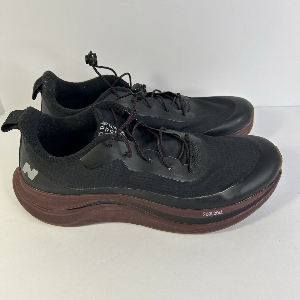 New Balance Fuelcell Propel v4 Mens Size 12D Black Purple Running Shoes Sneakers